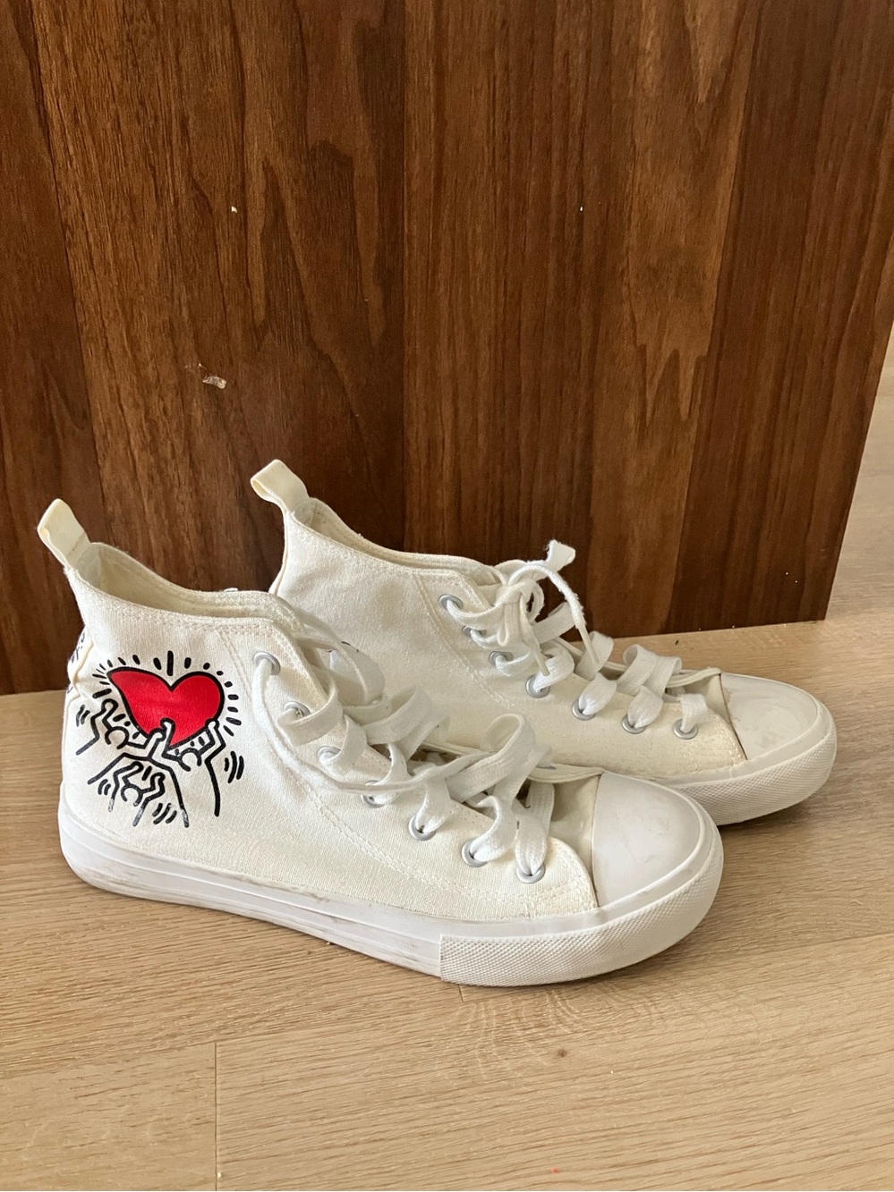 White High-Top Canvas Sneakers with Red Heart Graphic Keith Haring and H&M colab